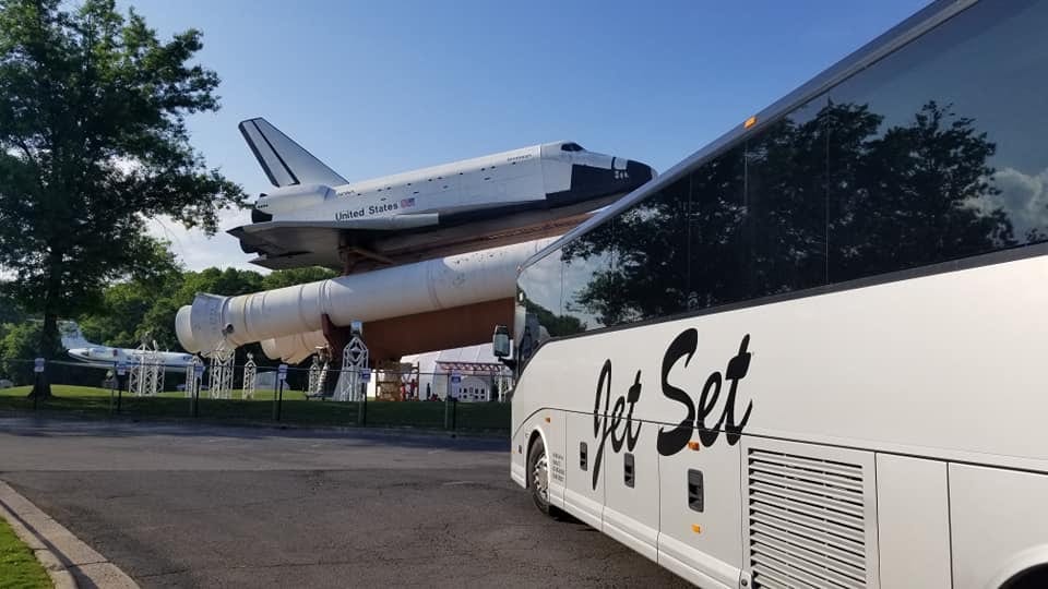 A Jet Set Express motorcoach on the road